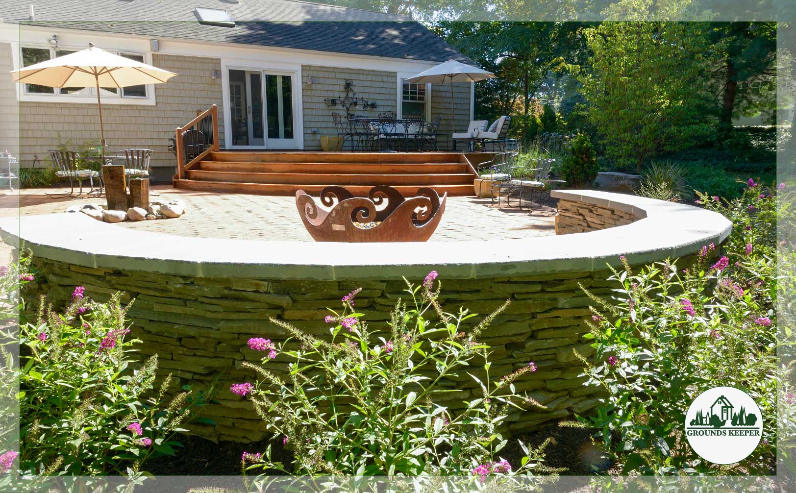 curved retaining wall patio and fire pit