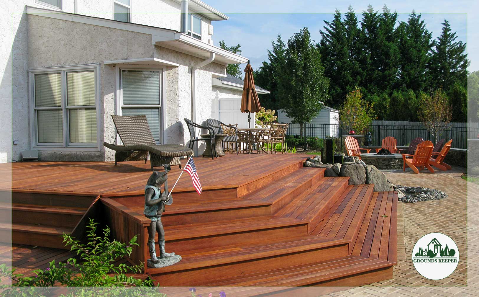 deck with fire pit in background