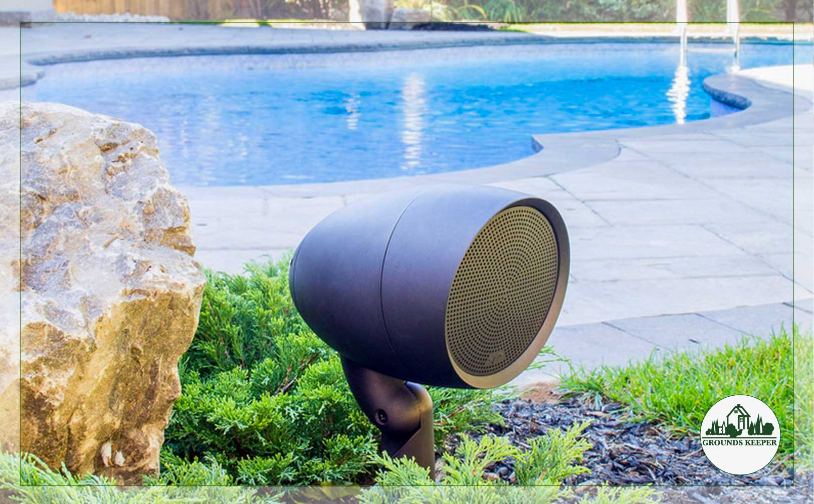 outdoor speaker beside pool