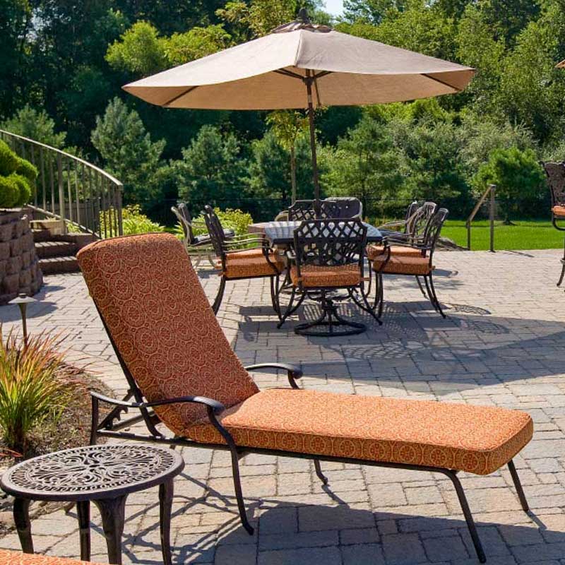 patio with grill and lounge chairs