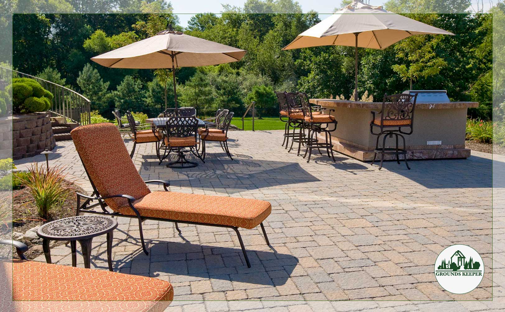 patio with grill kitchen and lounge chairs