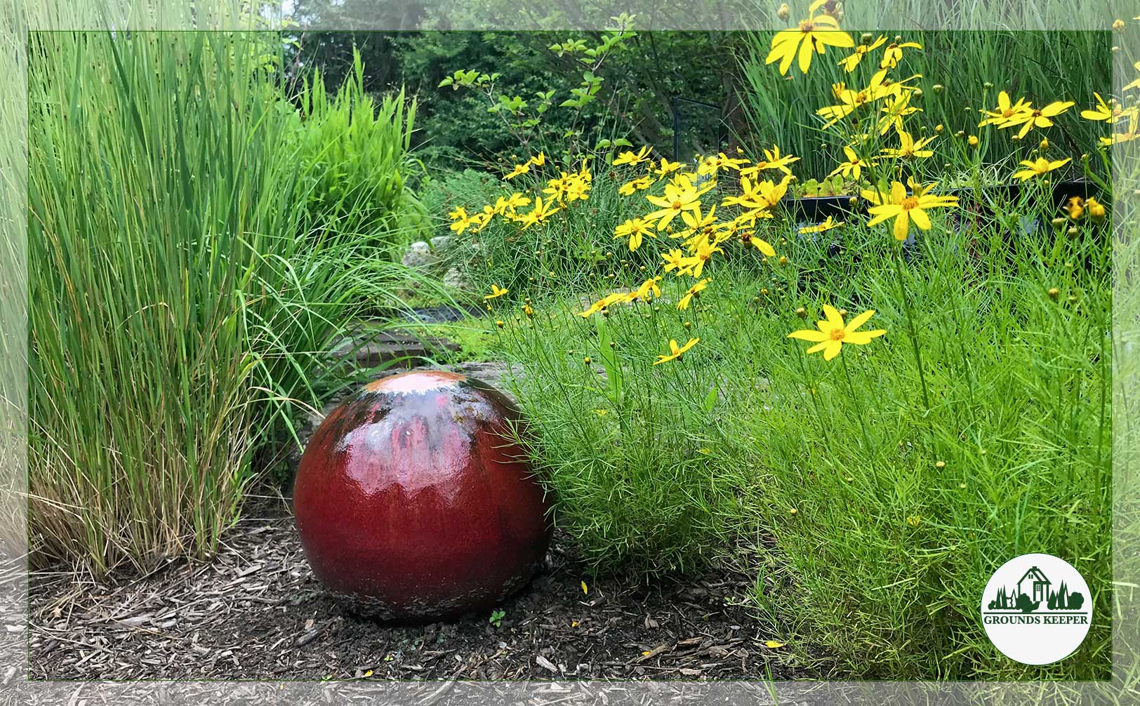 yellow flowers and red bubbler