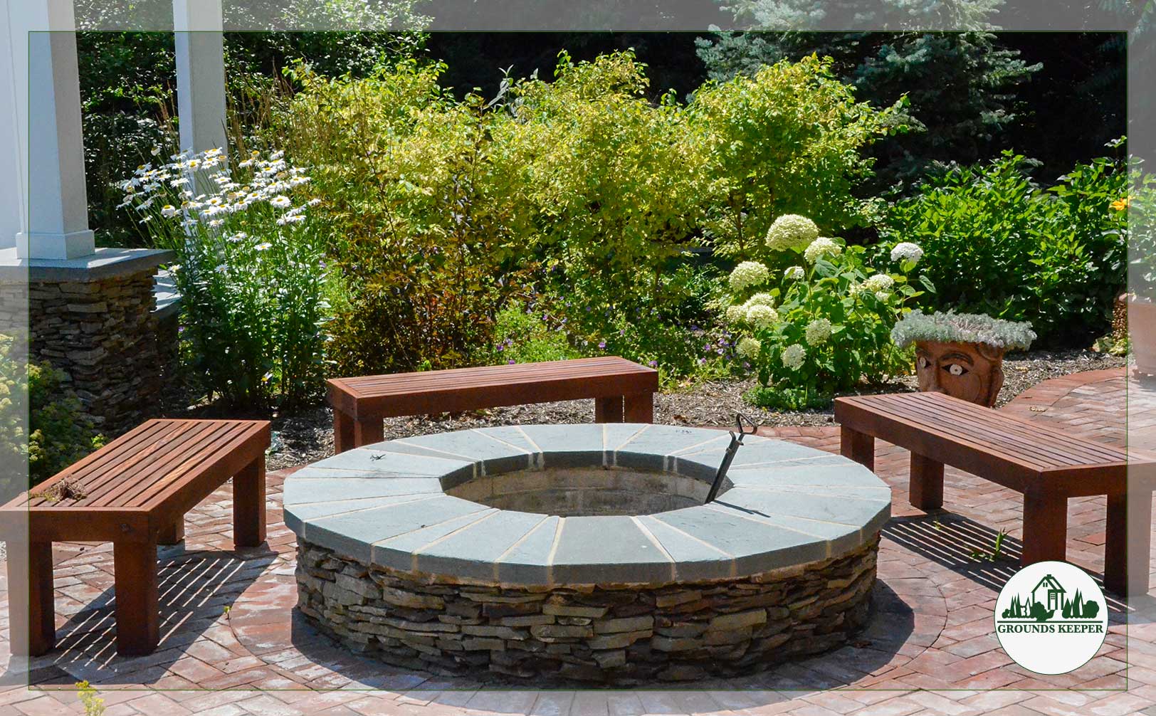 stone fire pit with wood benches 