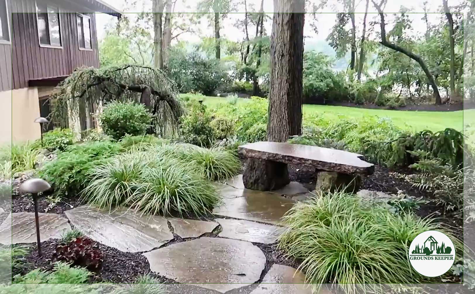 rainy day landscape stone bench grass bark 