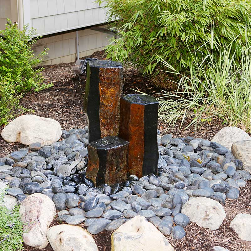 side yard bubbling water columns